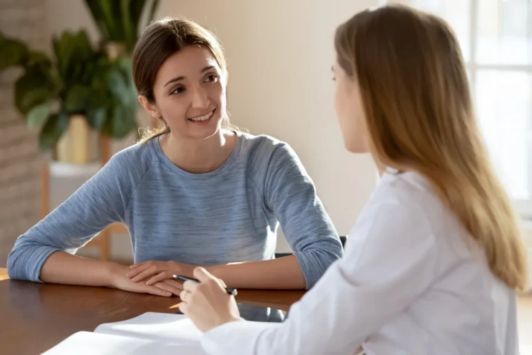 Woman consulting with healthcare provider about testosterone injections and creams in Whitefish, Montana.